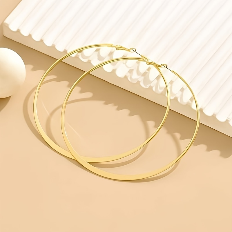 Stylish Golden Earrings with Large Hoops